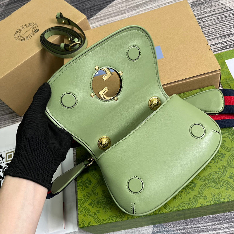 Side profile of statement sleek women's handbag – women's statement bag