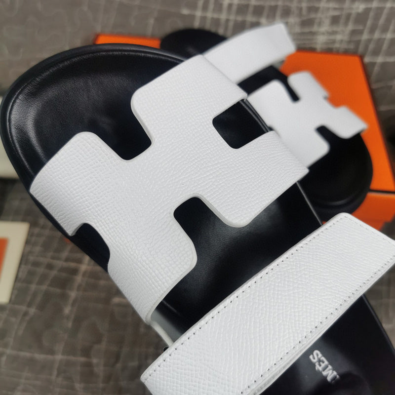 Hermès Black Slide Sandals - Close-Up Texture View