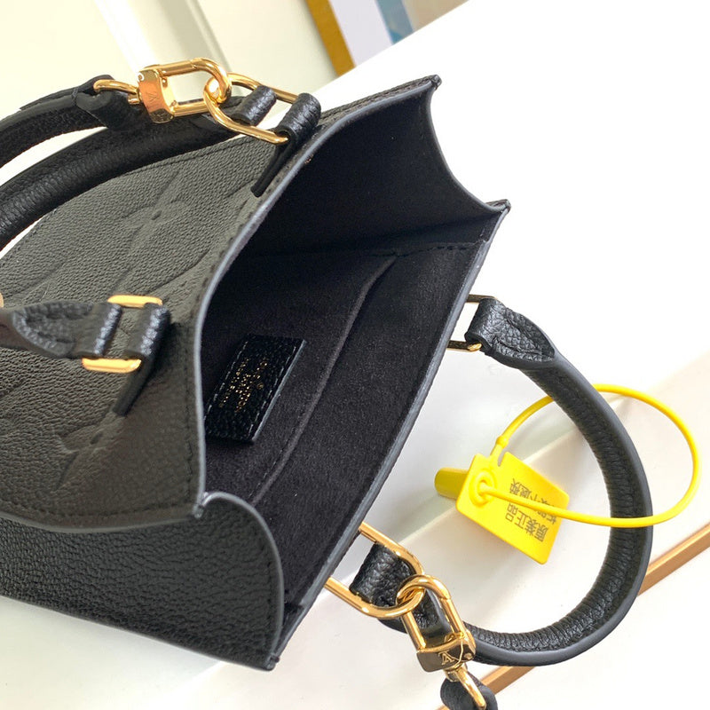 Front view of polished sleek women's handbag – women's luxury accessory