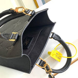 Front view of polished sleek women's handbag – women's luxury accessory