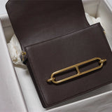 Side view of polished structured handbag