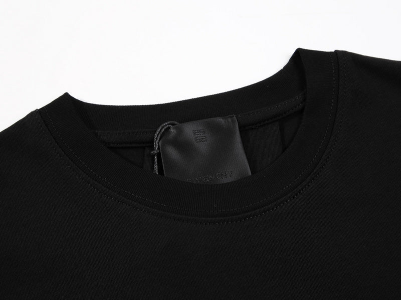 Close-up detail shot of Givenchy luxury clothing with signature branding
