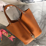 Side view of timeless structured handbag