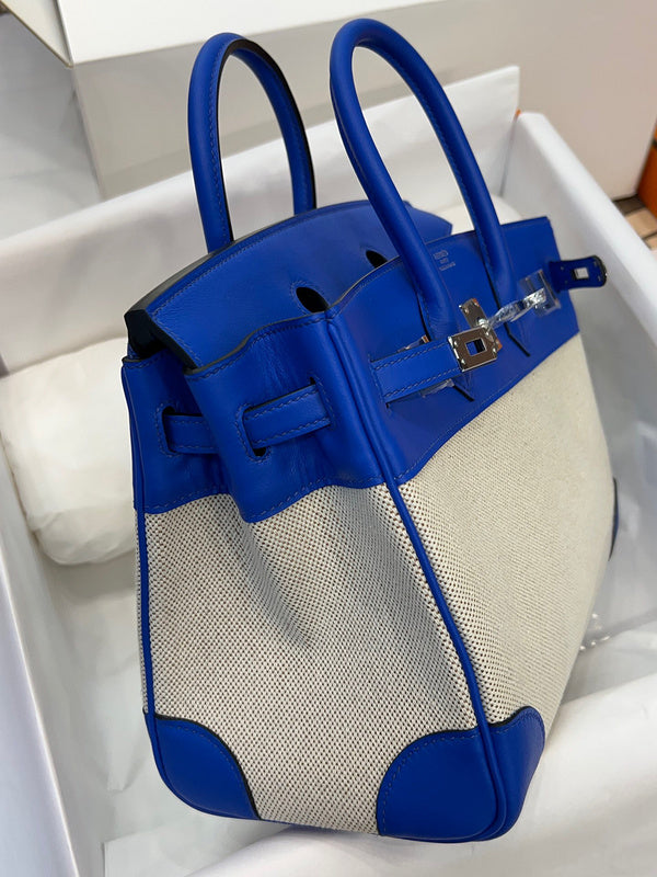 Side view of fluid structured handbag