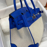 Side view of fluid structured handbag