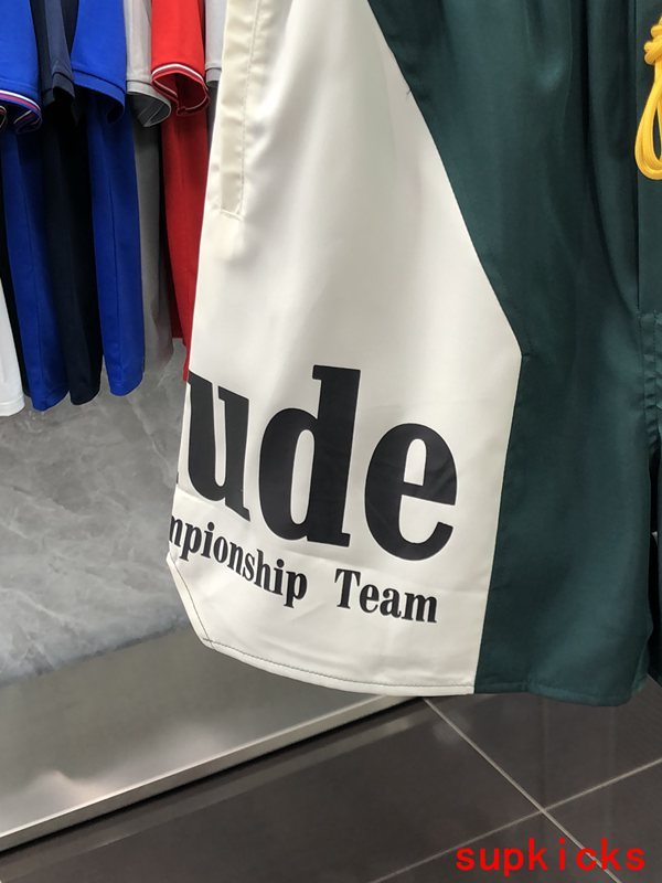 Flat lay presentation of Rhude luxury clothing with streetwear-inspired cut