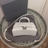 Back view of elevated signature women's handbag – women's designer-style accessory