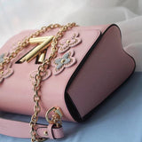 Styled lifestyle shot of premium sleek women's handbag – women's statement bag