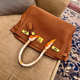 Side view of considered structured handbag