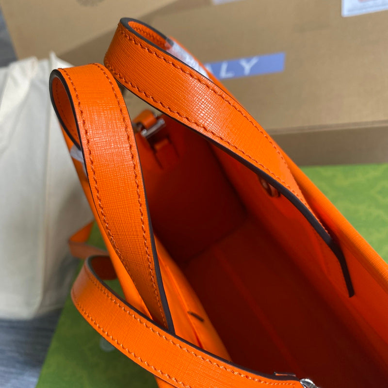 Top view of elevated classic women's handbag – women's statement bag