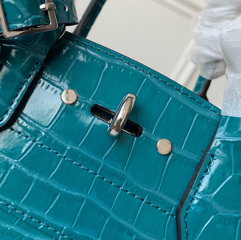 Interior view of modern polished women's handbag – women's statement bag
