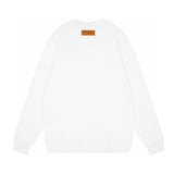 Side profile of Louis Vuitton luxury clothing with logo-detail design