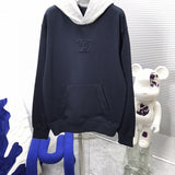 Front view of Louis Vuitton luxury clothing with contemporary cut