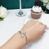 Front view of Cartier unisex jewelry piece