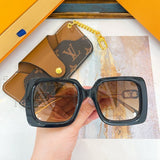 Angled view of Louis Vuitton unisex sunglasses