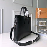 Side profile of chic polished women's handbag – women's premium purse