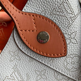 Handle and strap detail of polished premium women's handbag – women's everyday handbag