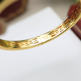 Close-up detail view of Cartier unisex jewelry piece
