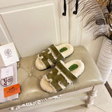 Hermès Chocolate Brown Slide Sandals - Angled View