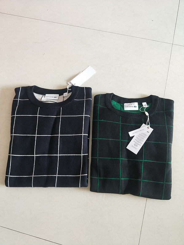 Close-up detail shot of Lacoste luxury clothing with signature branding