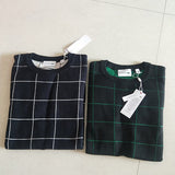Close-up detail shot of Lacoste luxury clothing with signature branding
