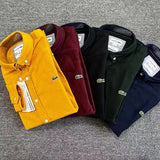 Flat lay presentation of Lacoste luxury clothing with logo-detail design