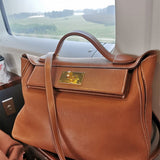  Essential tote bag carried on shoulder
