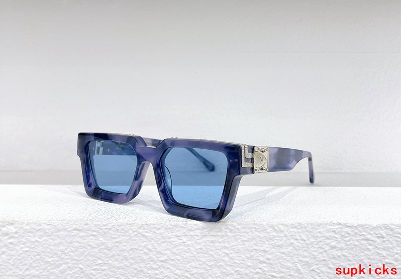 Close-up detail view of Louis Vuitton unisex sunglasses