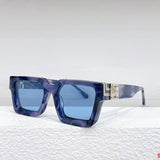 Close-up detail view of Louis Vuitton unisex sunglasses