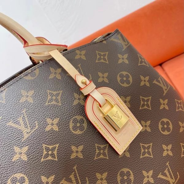 Back view of chic classic women's handbag – women's luxury accessory