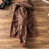 Back view of Louis Vuitton luxury clothing with everyday silhouette