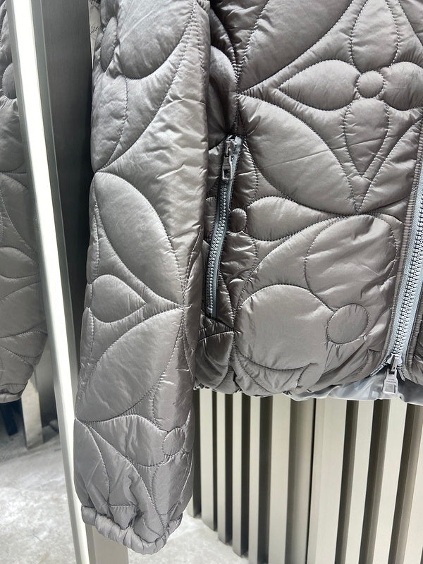 Flat lay presentation of Louis Vuitton luxury clothing with logo-detail design