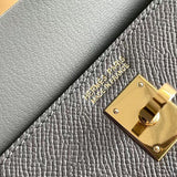 Side view of clean-lined structured handbag
