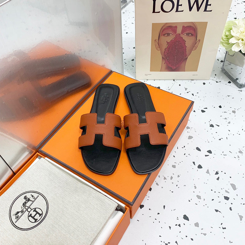 Hermès Tan Crisscross Strap Sandals - Angled View