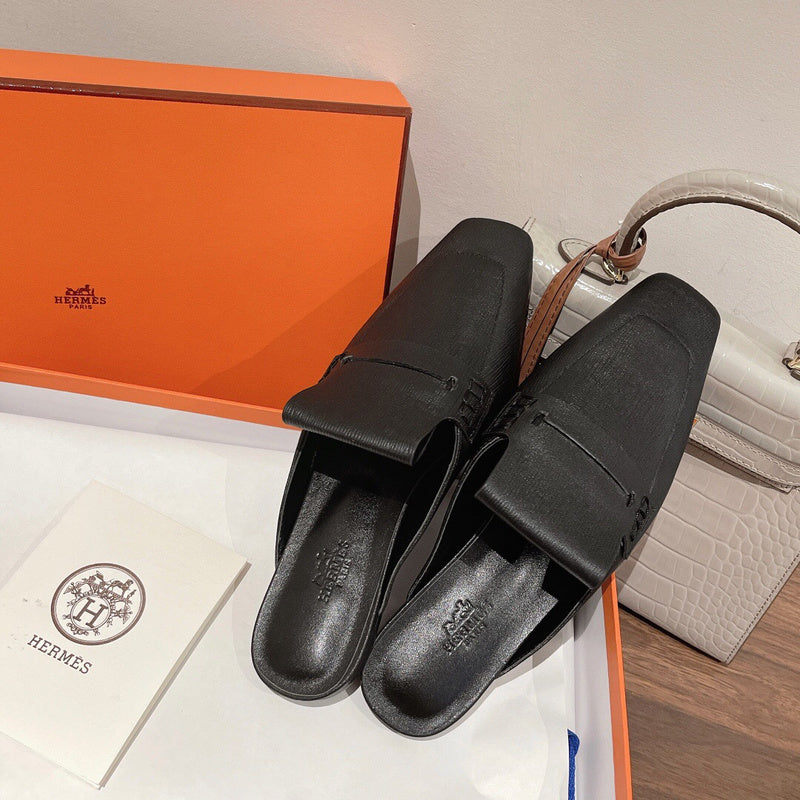 Hermès White High-Top Sneakers - Studio Shot