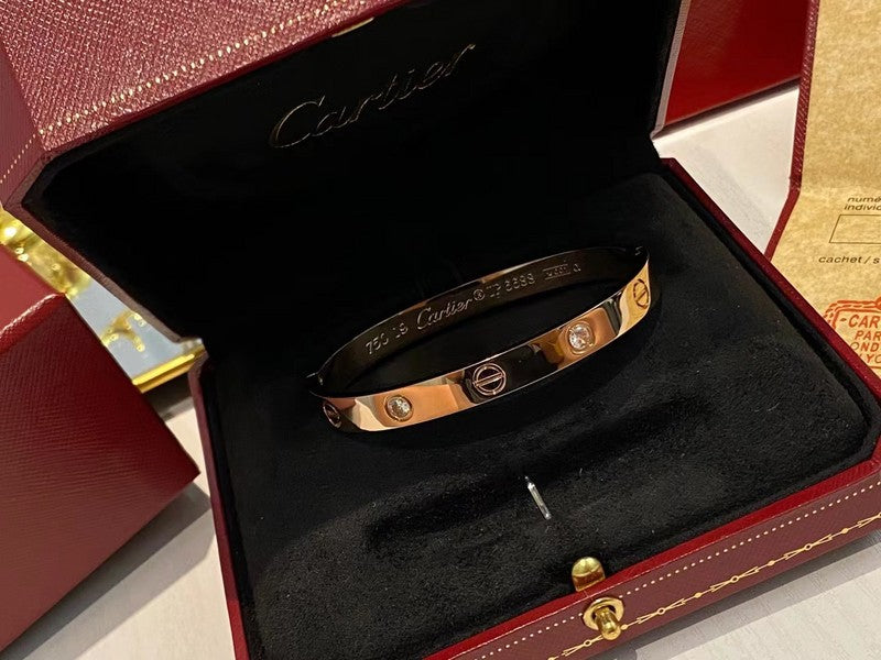 Close-up detail view of Cartier unisex jewelry piece