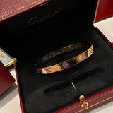 Close-up detail view of Cartier unisex jewelry piece