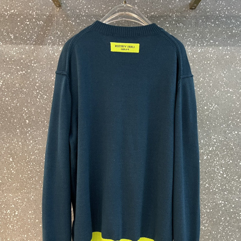 Back view of Louis Vuitton luxury clothing with label-forward styling