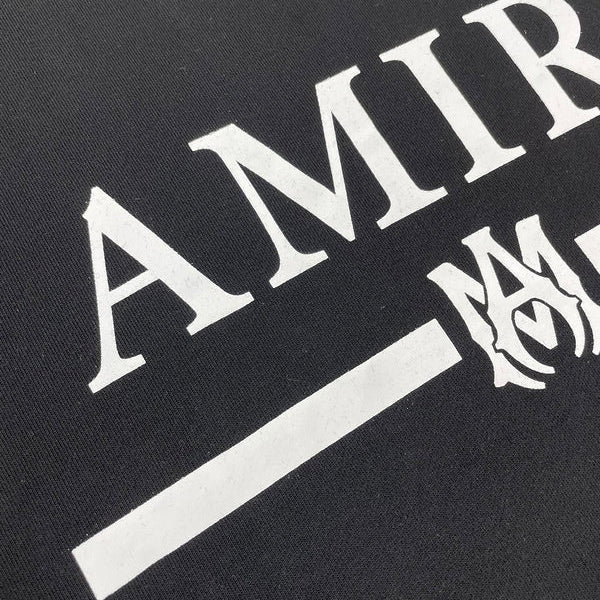 Three-quarter angle view of Amiri luxury piece style No.068