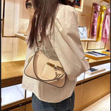 Close-up detail of everyday-luxe chic women's handbag – women's everyday handbag