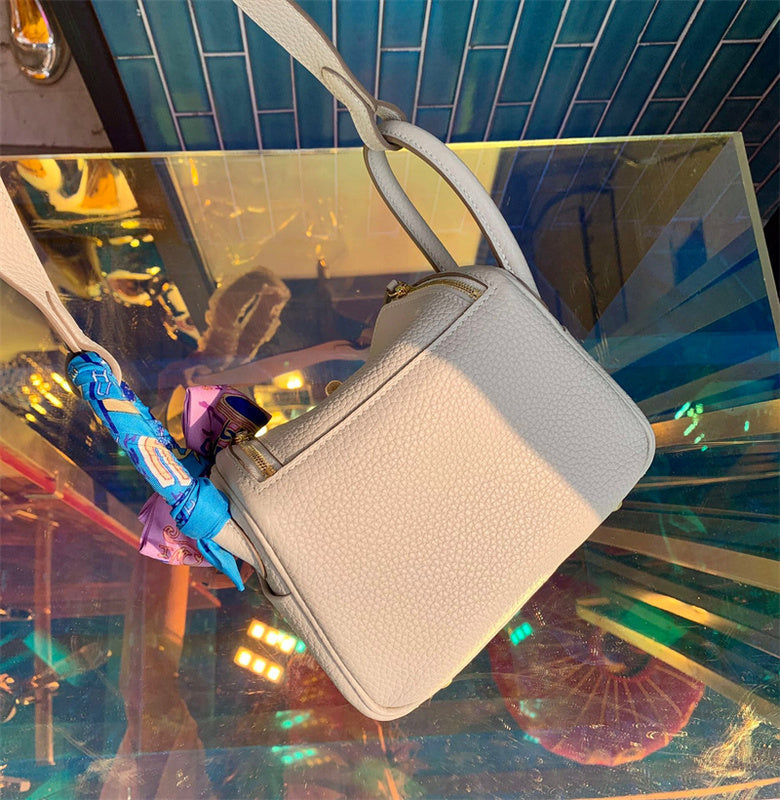 Side view of versatile structured handbag