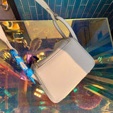 Side view of versatile structured handbag