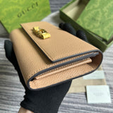 Back view of polished signature women's handbag – women's designer-style accessory
