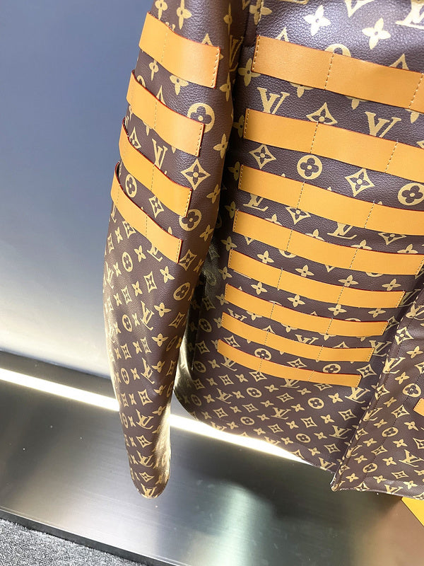 Flat lay presentation of Louis Vuitton luxury clothing with runway-inspired design