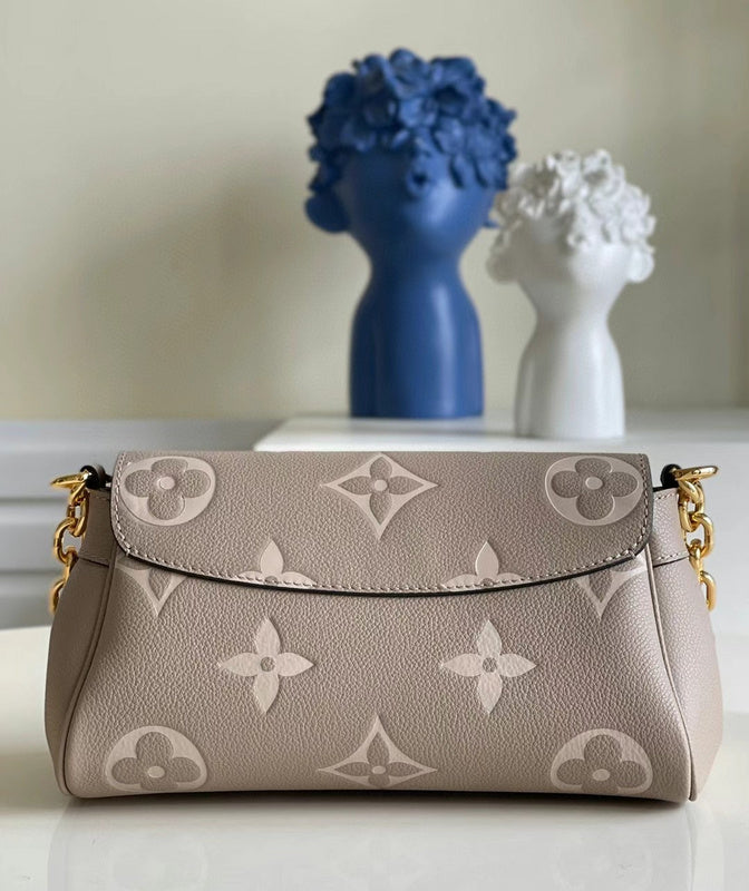 Styled lifestyle shot of refined structured women's handbag – women's designer-style accessory