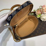 Side profile of sleek statement women's handbag – women's statement bag