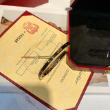 Angled view of Cartier unisex jewelry piece