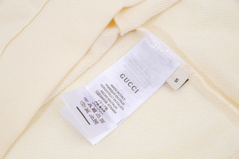 Close-up detail shot of Gucci luxury clothing with everyday silhouette