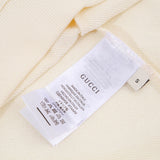 Close-up detail shot of Gucci luxury clothing with everyday silhouette