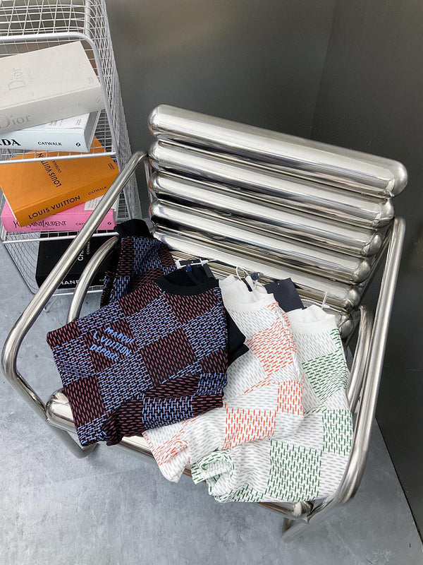Close-up detail shot of Louis Vuitton luxury clothing with label-forward styling